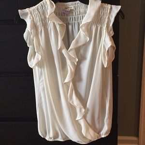 Sleeveless ruffled blouse